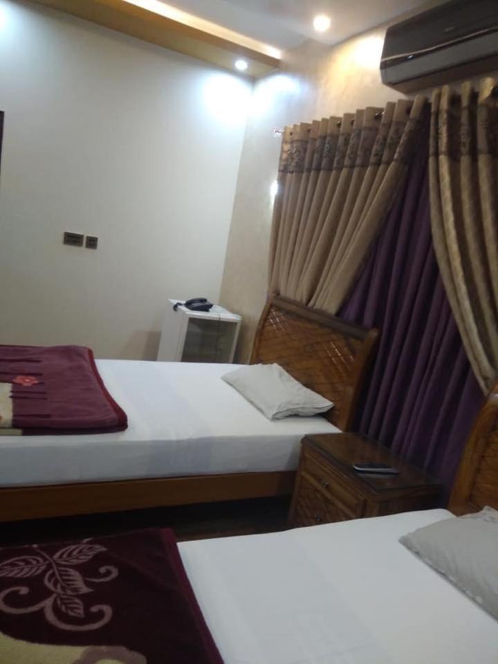 Embassy Lodge Karachi Extérieur photo